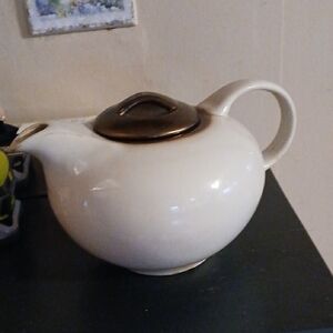 Elegant Cream Teapot with Brown Lid